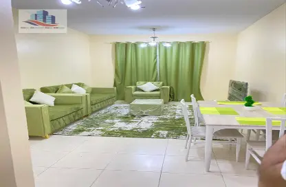 Living / Dining Room image for: Apartment - 2 Bedrooms - 2 Bathrooms for rent in Al Taawun - Sharjah, Image 1