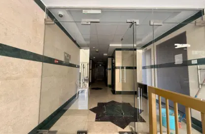 عمارة بالكامل - استوديو - 8 حمامات للبيع في مجمع مويلح - تجارية مويلح - الشارقة
