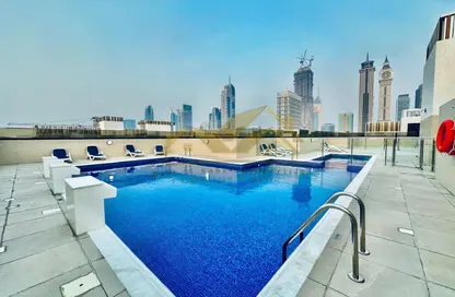 Apartment - 1 Bedroom - 2 Bathrooms for rent in Jumeirah Garden City - Al Satwa - Dubai