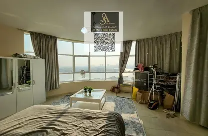 شقة - غرفة نوم - 2 حمامات للبيع في أورينت تاور 1 - أورينت تاور - البستان - عجمان