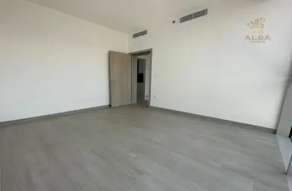 Empty Room image for: Apartment - 1 Bedroom - 2 Bathrooms for sale in Luma21 - Jumeirah Village Circle - Dubai, Image 1