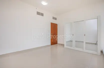 Empty Room image for: Apartment - 1 Bedroom - 1 Bathroom for rent in JS Tower - Dubai Sports City - Dubai, Image 1