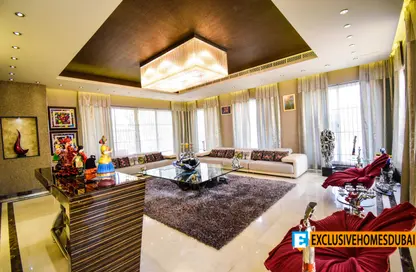 Living Room image for: Villa - 6 Bedrooms - 7 Bathrooms for sale in Ponderosa - The Villa - Dubai, Image 1
