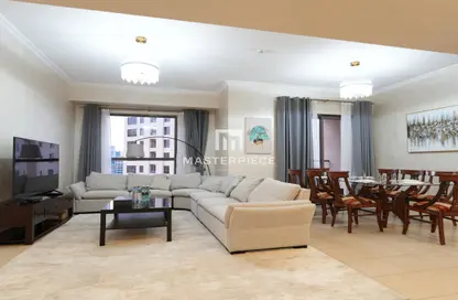 Living / Dining Room image for: Apartment - 2 Bedrooms - 3 Bathrooms for rent in Shams 4 - Shams - Jumeirah Beach Residence - Dubai, Image 1