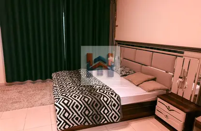 شقة - غرفة نوم - 2 حمامات للايجار في أورينت تاور 2 - أورينت تاور - البستان - عجمان