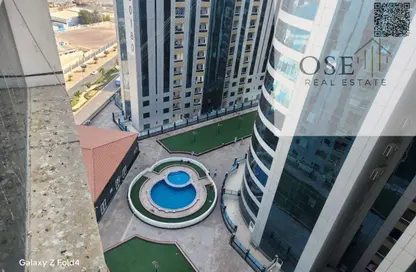 شقة - غرفة نوم - 2 حمامات للبيع في أورينت تاور 1 - أورينت تاور - البستان - عجمان