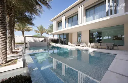 Pool image for: Villa - 6 Bedrooms - 7 Bathrooms for sale in Umm Al Sheif Villas - Umm Al Sheif - Dubai, Image 1