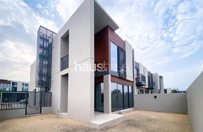 Outdoor Building image for: Townhouse - 4 Bedrooms - 5 Bathrooms for sale in Cherrywoods - Dubai Land - Dubai, Image 1