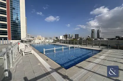 صورة لـ حوض سباحة شقة - 1 حمام للبيع في برج سيدني - قرية الجميرا سركل - دبي ، صورة رقم 1