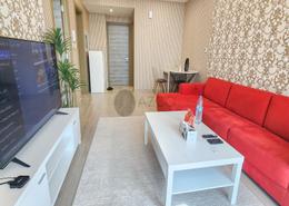 Living Room image for: Apartment - 1 bedroom - 2 bathrooms for rent in Bloom Towers B - Bloom Towers - Jumeirah Village Circle - Dubai, Image 1