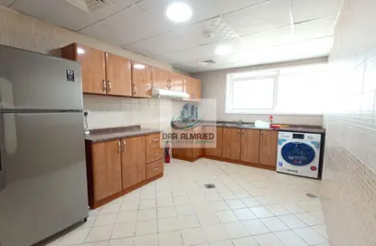Kitchen image for: Apartment - 2 Bedrooms - 2 Bathrooms for rent in Bukhara Street - Al Nahda - Sharjah, Image 1