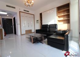 صورةغرفة المعيشة لـ: Studio - 1 حمام للبيع في ستارز من دانوب - الفرجان - دبي, صورة 1
