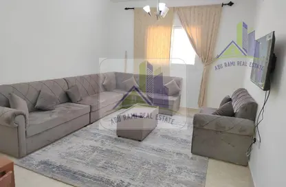 Living Room image for: Apartment - 2 Bedrooms - 3 Bathrooms for rent in Ideal 1 - Al Rawda 3 - Al Rawda - Ajman, Image 1