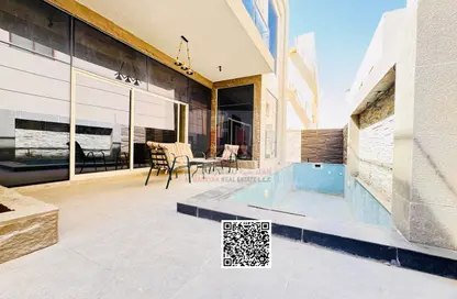 Villa - 5 Bedrooms - 7 Bathrooms for sale in Ajman Hills - Al Alia - Ajman