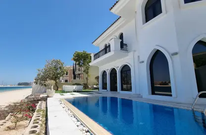 Villa - 4 Bedrooms - 5 Bathrooms for rent in Garden Homes Frond E - Garden Homes - Palm Jumeirah - Dubai