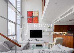 Living Room image for: Apartment - 2 bedrooms - 3 bathrooms for sale in Central Park Residential Tower - Central Park Tower - DIFC - Dubai, Image 1