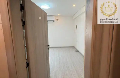 Apartment - Studio - 1 Bathroom for rent in Al Azza Building - Al Rumaila - Ajman