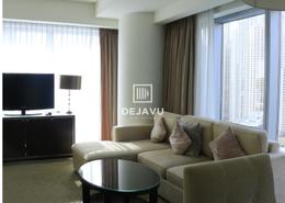 صورةغرفة المعيشة لـ: شقة - 2 غرف نوم - 2 حمامات للبيع في فندق العنوان دبي مارينا - دبي مارينا - دبي, صورة 1