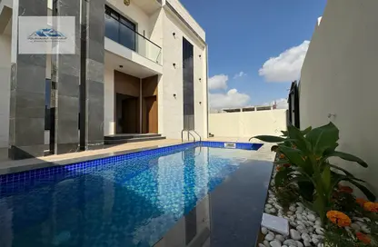 Pool image for: Villa - 4 Bedrooms - 6 Bathrooms for sale in Al Bahia Hills - Al Bahia - Ajman, Image 1