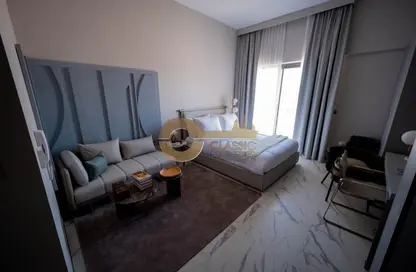Room / Bedroom image for: Apartment - 1 Bathroom for rent in MAG Eye - District 7 - Mohammed Bin Rashid City - Dubai, Image 1