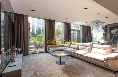 Living Room image for: Apartment - 4 Bedrooms - 5 Bathrooms for sale in Apartment Building 2 - Bluewaters Residences - Bluewaters - Dubai, Image 1