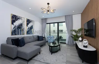 Living Room image for: Apartment - 1 Bedroom - 1 Bathroom for rent in Al Thayyal 1 - Al Thayyal - Greens - Dubai, Image 1