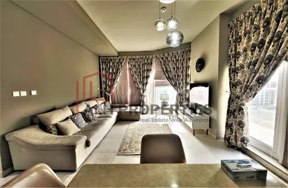 صورة لـ غرفة المعيشة شقة - 2 غرف نوم - 3 حمامات للبيع في مسكن بلاتينيوم 2 - واحة السيليكون - دبي ، صورة رقم 1
