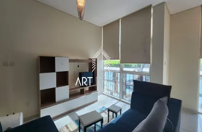 Living Room image for: Apartment - 1 Bedroom - 2 Bathrooms for rent in Park Central - Business Bay - Dubai, Image 1