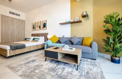 Living Room image for: Apartment - 1 Bathroom for rent in Millennium Binghatti Residences - Business Bay - Dubai, Image 1