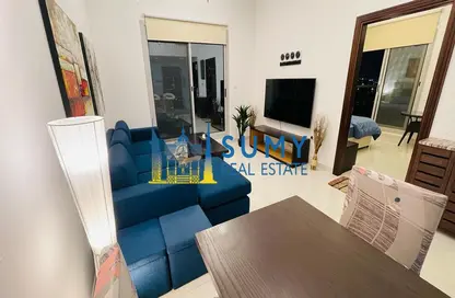 Living Room image for: Apartment - 1 Bedroom - 2 Bathrooms for rent in Elite Sports Residence - Dubai Sports City - Dubai, Image 1