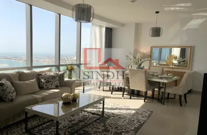 Living / Dining Room image for: Apartment - 2 Bedrooms - 3 Bathrooms for rent in Etihad Tower 4 - Etihad Towers - Corniche Road - Abu Dhabi, Image 1