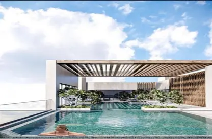 Pool image for: Apartment - 1 Bedroom - 1 Bathroom for sale in Q Gardens Lofts - Jumeirah Village Circle - Dubai, Image 1
