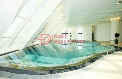 صورة لـ حوض سباحة شقة - غرفة نوم - 2 حمامات للايجار في برج محمد بن راشد في المركز التجاري العالمي - شارع الكورنيش - أبوظبي ، صورة رقم 1