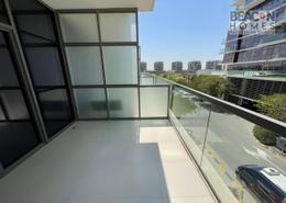 Balcony image for: Apartment - 1 bedroom - 2 bathrooms for sale in Golf Panorama B - Golf Panorama - DAMAC Hills - Dubai, Image 1
