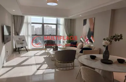 Living / Dining Room image for: Apartment - 2 Bedrooms - 3 Bathrooms for sale in Gulfa Towers - Al Rashidiya 1 - Al Rashidiya - Ajman, Image 1