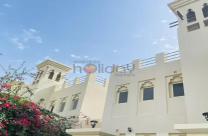 Outdoor Building image for: Townhouse - 4 Bedrooms - 4 Bathrooms for rent in The Townhouses at Al Hamra Village - Al Hamra Village - Ras Al Khaimah, Image 1