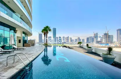 Pool image for: Apartment - 2 Bedrooms - 3 Bathrooms for rent in Bay's Edge - Business Bay - Dubai, Image 1