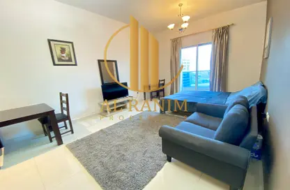Living Room image for: Apartment - 1 Bathroom for rent in Elite Sports Residence 4 - Elite Sports Residence - Dubai Sports City - Dubai, Image 1