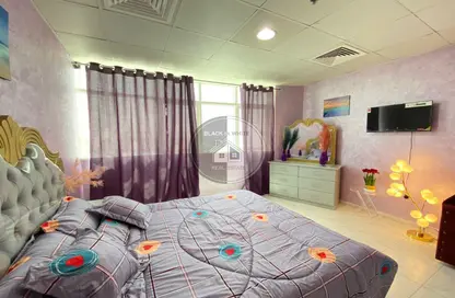 Room / Bedroom image for: Apartment - 1 Bathroom for rent in RAK Tower - Al Seer - Ras Al Khaimah, Image 1