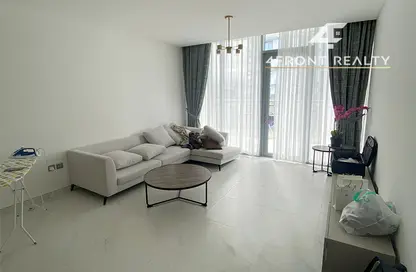 Living Room image for: Apartment - 1 Bedroom - 2 Bathrooms for rent in District One Phase III - District One - Mohammed Bin Rashid City - Dubai, Image 1