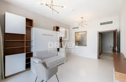 Living Room image for: Apartment - 1 Bedroom - 2 Bathrooms for sale in Binghatti East Boutique Suites - Dubai Residence Complex - Dubai, Image 1