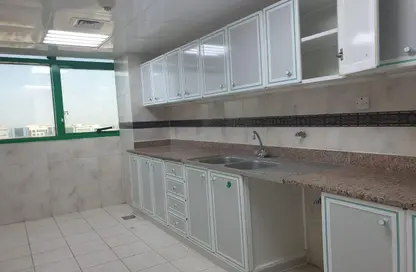 Kitchen image for: Apartment - 2 Bedrooms - 2 Bathrooms for rent in Airport Road - Abu Dhabi, Image 1