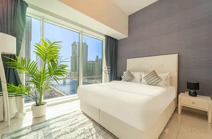صورة لـ غرفة- غرفة النوم شقة - 1 حمام للايجار في برج وارف الغربي - الخليج التجاري - دبي ، صورة رقم 1