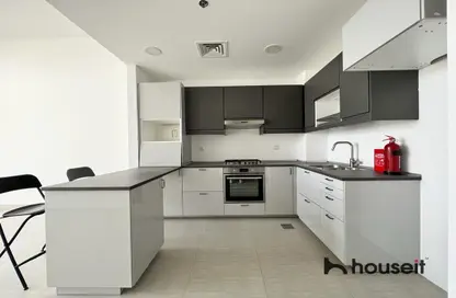 Kitchen image for: Apartment - 2 Bedrooms - 2 Bathrooms for sale in Rawda Apartments 2 - Rawda Apartments - Town Square - Dubai, Image 1