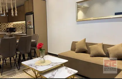 Living / Dining Room image for: Apartment - 3 Bedrooms - 3 Bathrooms for rent in Marina Pinnacle - Dubai Marina - Dubai, Image 1
