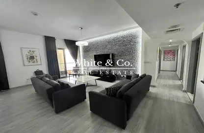 Living Room image for: Apartment - 2 Bedrooms - 3 Bathrooms for sale in Shams 1 - Shams - Jumeirah Beach Residence - Dubai, Image 1