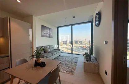 Living / Dining Room image for: Apartment - 1 Bedroom - 2 Bathrooms for rent in Sobha Hartland Waves - Sobha Hartland - Mohammed Bin Rashid City - Dubai, Image 1
