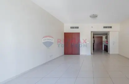 Empty Room image for: Apartment - 1 Bathroom for sale in Massar Building - Jumeirah Village Circle - Dubai, Image 1