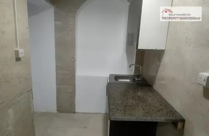 صورة لـ مطبخ شقة - 1 حمام للايجار في معسكر آل نهيان - أبوظبي ، صورة رقم 1
