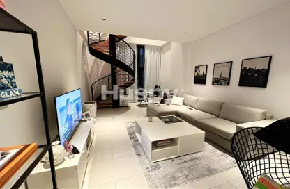 Living Room image for: Apartment - 1 Bedroom - 2 Bathrooms for sale in Marquise Square Tower - Business Bay - Dubai, Image 1